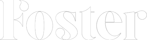 The word Foster is written in a thin, elegant, serif font with large curving letterforms and subtle gray outlines on a white background.